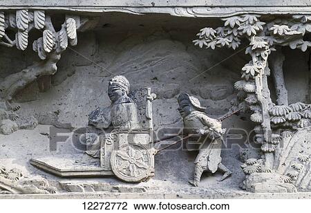 Stone carvings on the entrance gate to the Twin Pagodas and remains of the Main Hall of the Arhat Temple, Suzhou, Jiangsu, China View Large Photo Image Stock Image - Stone carvings on the entrance gate to the Twin Pagodas and remains of the Main Hall of the Arhat Temple, Suzhou, Jiangsu, China. Fotosearch