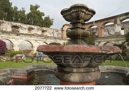 Stock Image - Stone Fountain In The Main Courtyard Of The Santa Clara Church And Convent, Antigua Guatemala, Sacatep. Fotosearch
