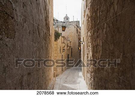 Stock Photo - Stone Houses On A Narrow Street, Mdina, Malta. Fotosearch