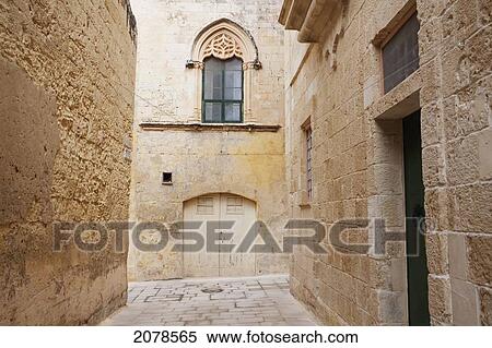 Stock Photography - Stone Houses On A Narrow Street, Mdina, Malta. Fotosearch