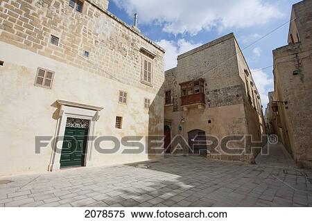 Stock Photography - Stone Houses On A Narrow Street, Mdina, Malta. Fotosearch