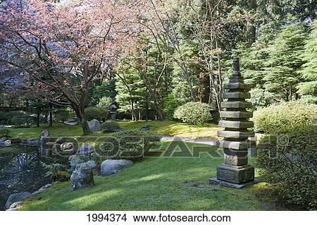Stone Pagoda In Nitobe Memorial Garden, A Traditional Japanese Tea And Stroll Garden Located At The University Of British Columbia, Vancouver, British Columbia, Canada View Large Photo Image Picture - Stone Pagoda In Nitobe Memorial Garden, A Traditional Japanese Tea And Stroll Garden Located At The University Of British Columbia, Vancouver, British Columbia, Canada. Fotosearch
