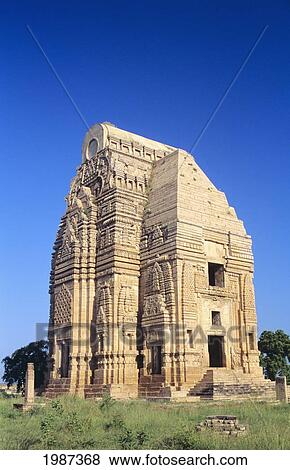 Stone structure among grass near Gwalior Fort in Teli Ka Mandir Temple; India View Large Photo Image Stock Photo - Stone structure among grass near Gwalior Fort in Teli Ka Mandir Temple; India. Fotosearch