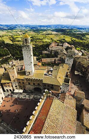 Stone tower and rooftops; San Gimignano, Tuscany, Italy View Large Photo Image Stock Photography - Stone tower and rooftops; San Gimignano, Tuscany, Italy. Fotosearch