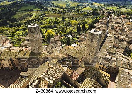 Stone towers and rooftops; San Gimignano, Tuscany, Italy View Large Photo Image Picture - Stone towers and rooftops; San Gimignano, Tuscany, Italy. Fotosearch