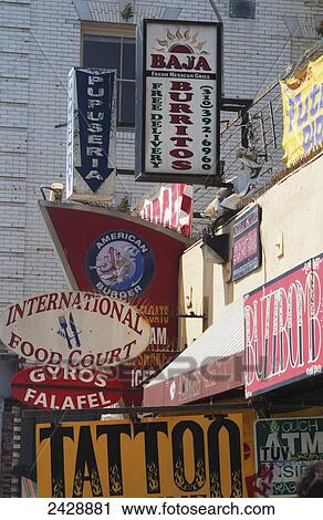 Stock Image - Store signs at Venice Beach; Los Angeles, California, United States of America. Fotosearch