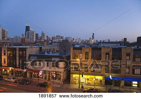 Stock Photo - Stores Along North Avenue At Dusk, Cityscape In Foreground. Fotosearch