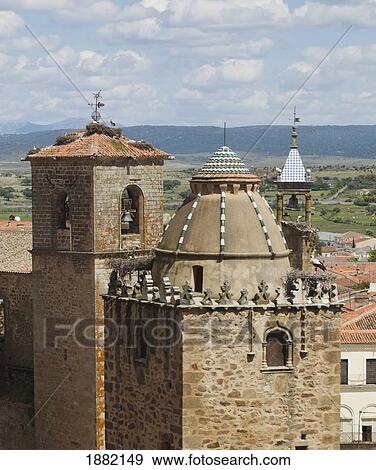 Stock Photo - Storks And Their Nests On A Tower; Trujillo, Caceres, Spain. Fotosearch