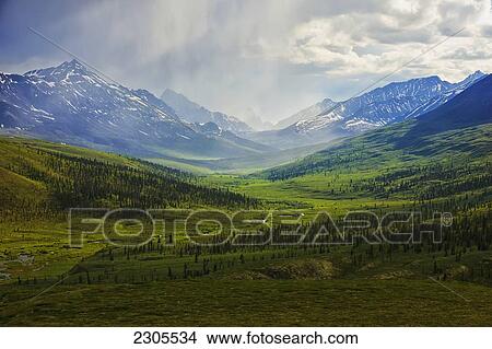 Picture - Storm Clouds Over The Klondike Valley In Tombstone Territorial Park Near The End Of Dempster Highway; Yukon Canada. Fotosearch