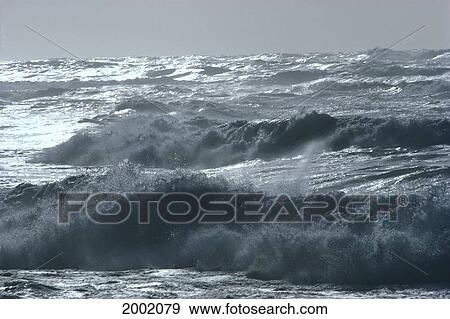 Stormy Ocean Water With Turbulent Waves, Gray With Silver Reflections View Large Photo Image Stock Photo - Stormy Ocean Water With Turbulent Waves, Gray With Silver Reflections. Fotosearch