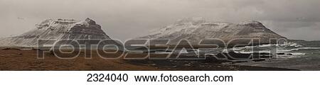 Stock Image - Stormy skies towards Northurfjothur along the Strandir coast; Westfjords, Iceland. Fotosearch