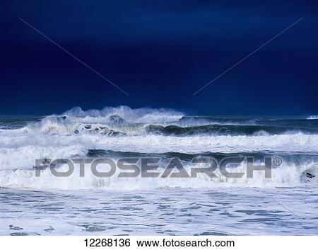 Stock Photograph - Stormy weather generates heavy surf; Winchester Bay, Oregon, United States of America. Fotosearch