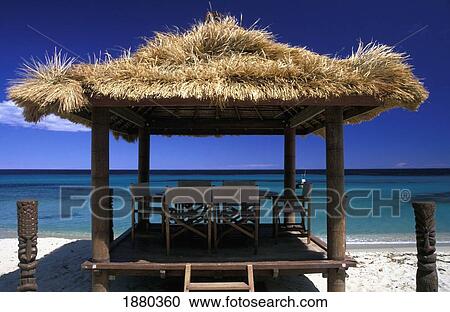 Stock Image - Straw Shelter On Pampellone Beach, Ramatuelle; St. Tropez, France. Fotosearch