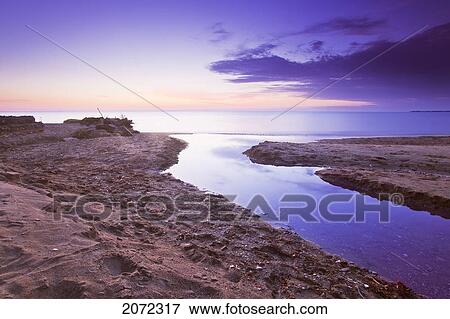 Stream Feeding Into Lake Winnipeg At Dawn, Gimli, Manitoba, Canada View Large Photo Image Stock Photo - Stream Feeding Into Lake Winnipeg At Dawn, Gimli, Manitoba, Canada. Fotosearch
