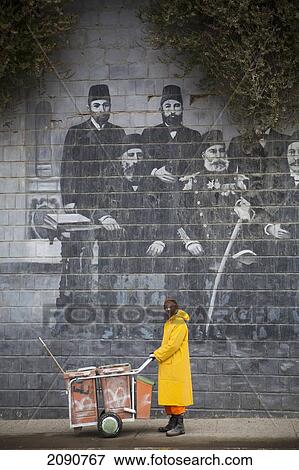 Street Cleaner In Front Of Mural Of Famous Kurdish People, Sulaymaniyah, Iraqi Kurdistan, Iraq View Large Photo Image Stock Photo - Street Cleaner In Front Of Mural Of Famous Kurdish People, Sulaymaniyah, Iraqi Kurdistan, Iraq. Fotosearch