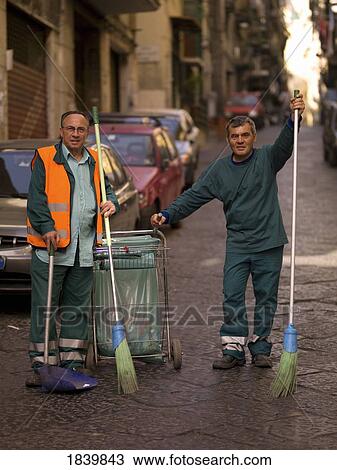 Stock Image - Street Cleaners With Brooms; Naples, Italy. Fotosearch