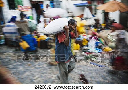 Stock Image - Street scene around the old city of Harar in Eastern Ethiopia; Harar, Ethiopia. Fotosearch