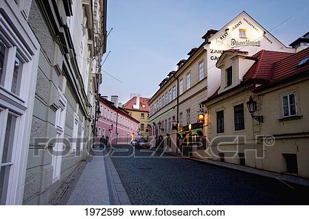 Stock Photo - Street Scene In The Castle District At Dusk, Prague, Czech Republic. Fotosearch