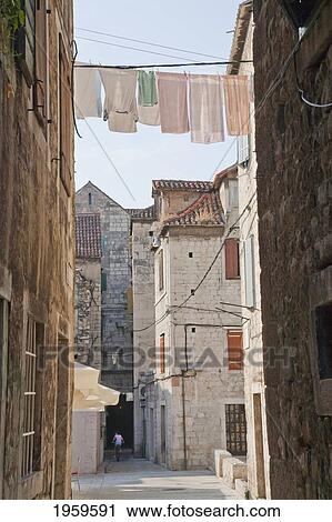 Stock Image - Street Scene With Clothesline, Split, Split-Dalmatia, Croatia. Fotosearch
