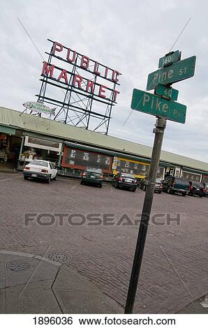 Stock Photograph - Street Signs And Cars Parked At A Public Market; Seattle, Washington, United States Of America. Fotosearch