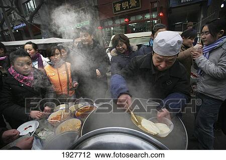 Street Stall Selling Food In The Muslim Quarter, Xian, Xi'an, Capital Of Shaanxi Province, China View Large Photo Image Stock Image - Street Stall Selling Food In The Muslim Quarter, Xian, Xi'an, Capital Of Shaanxi Province, China. Fotosearch