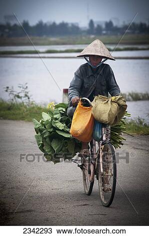 Stock Image - Street Vendor; Vietnam. Fotosearch
