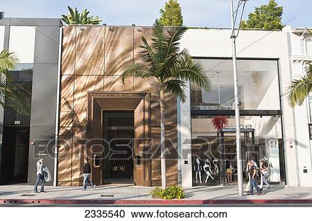 Stock Image - Street View With Fashionable Clothing Store; California, Usa. Fotosearch