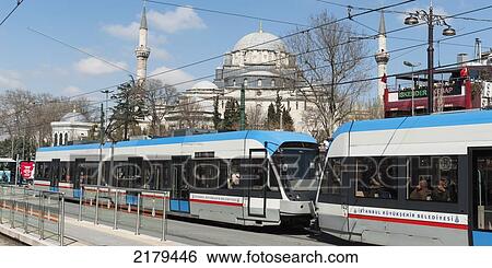 Stock Photograph - Streetcars With A Mosque In The Background; Istanbul Turkey. Fotosearch