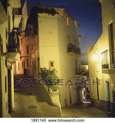 Streets In Ibiza Old Town Illuminated At Dusk View Large Photo Image Stock Image - Streets In Ibiza Old Town Illuminated At Dusk. Fotosearch