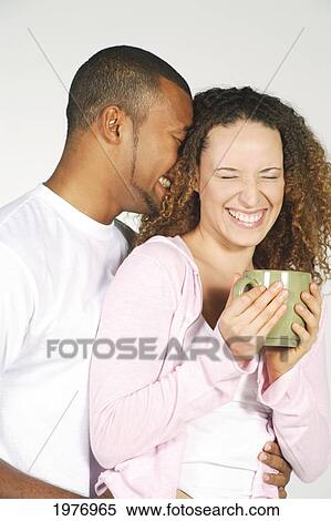 Studio Image Of Couple Laughing. View Large Photo Image Stock Photography - Studio Image Of Couple Laughing.. Fotosearch