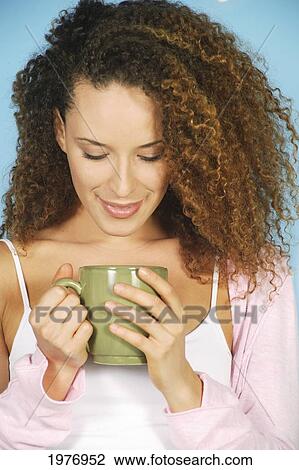 Studio Image Of Girl With Green Coffee Mug. View Large Photo Image Stock Image - Studio Image Of Girl With Green Coffee Mug.. Fotosearch