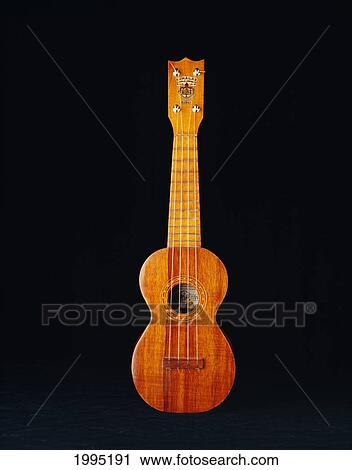 Stock Image - Studio Shot Of An Ukulele Made Of Koa, Kumalae.. Fotosearch