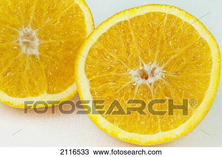 Studio shot of two orange halves. View Large Photo Image Stock Image - Studio shot of two orange halves.. Fotosearch