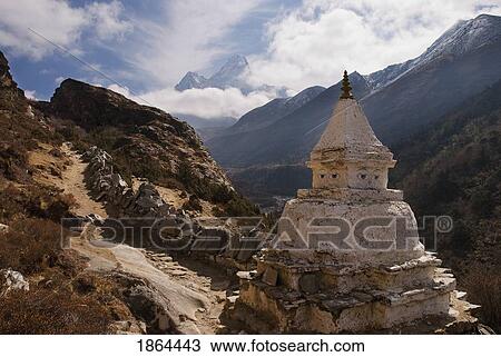 Stupa Along The Everest Base Camp Trail, With Ama Dablam In The Background; Ama Dablam, Dingboche, Nepal View Large Photo Image Stock Image - Stupa Along The Everest Base Camp Trail, With Ama Dablam In The Background; Ama Dablam, Dingboche, Nepal. Fotosearch