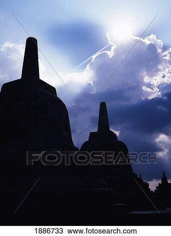 Stupas Silhouetted At Borobudur Temple View Large Photo Image Stock Image - Stupas Silhouetted At Borobudur Temple. Fotosearch