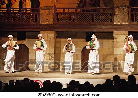 Stock Photo - Sufi Dance Performance At The Al-Ghouri Mausoleum At Night, Cairo, Al Qahirah, Egypt. Fotosearch