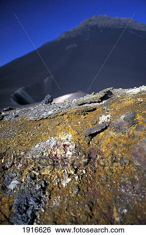 Stock Photograph - Sulphur Coated Rocks. Fotosearch
