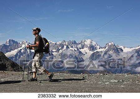 Stock Image - Summer hiking at Col des Gentianes in the Swiss Alps; Valais district, Switzerland. Fotosearch