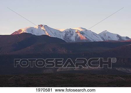 Stock Image - Summit Of Aucanquilcha At Dawn, Antofagasta Region, Chile. Fotosearch