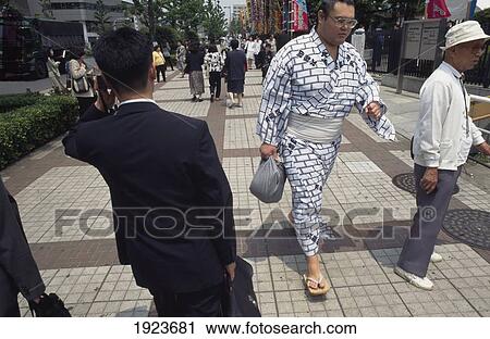 Stock Image - Sumo Wrestler Heading For The Arena. Fotosearch