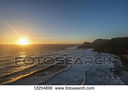 Sun setting along the Oregon Coast; Oregon, United States of America View Large Photo Image Stock Image - Sun setting along the Oregon Coast; Oregon, United States of America. Fotosearch
