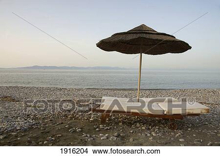 Sun Shade And Sun Loungers On Beach View Large Photo Image Picture - Sun Shade And Sun Loungers On Beach. Fotosearch