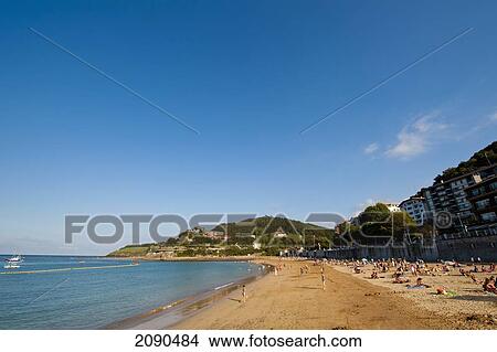 Sunbathing On The Beach, Lekeitio, Basque Country, Spain View Large Photo Image Picture - Sunbathing On The Beach, Lekeitio, Basque Country, Spain. Fotosearch