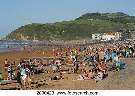 Sunbathing On The Beach, Zarautz, Basque Country, Spain View Large Photo Image Stock Image - Sunbathing On The Beach, Zarautz, Basque Country, Spain. Fotosearch
