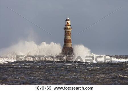 Sunderland, Tyne And Wear, England; Waves Crashing Into The Lighthouse View Large Photo Image Stock Image - Sunderland, Tyne And Wear, England; Waves Crashing Into The Lighthouse. Fotosearch