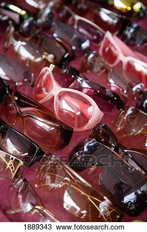 Stock Image - Sunglasses In A Market Stall, Close Up. Fotosearch