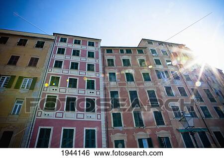 Sunlight Shining On Different Colored Buildings; Genoa Liguria Italy View Large Photo Image Stock Photograph - Sunlight Shining On Different Colored Buildings; Genoa Liguria Italy. Fotosearch
