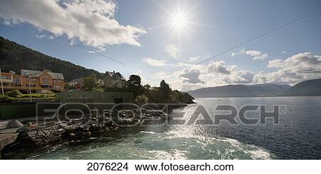 Picture - Sunlight Shining Over The Shoreline Of Sogneford; Sogn Norway. Fotosearch