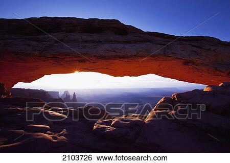 Stock Photograph - Sunrise At Mesa Arch; Utah United States Of America. Fotosearch