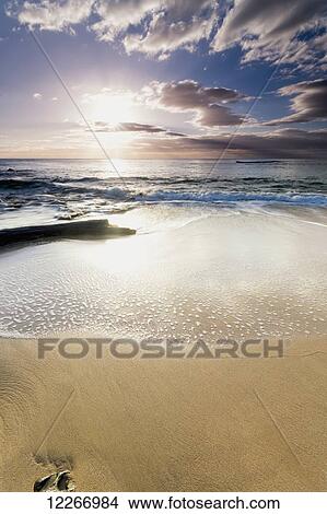 Sunrise from Lydgate Beach Park; Lydgate, Kauai, Hawaii, United States of America View Large Photo Image Picture - Sunrise from Lydgate Beach Park; Lydgate, Kauai, Hawaii, United States of America. Fotosearch
